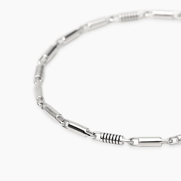 Bracciale regolabile con cilindri lucidi e incisioni nere ROLLER