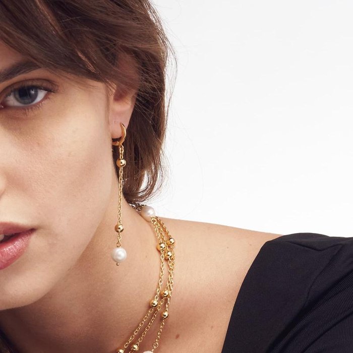 Orecchini in bronzo dorato con perla naturale
