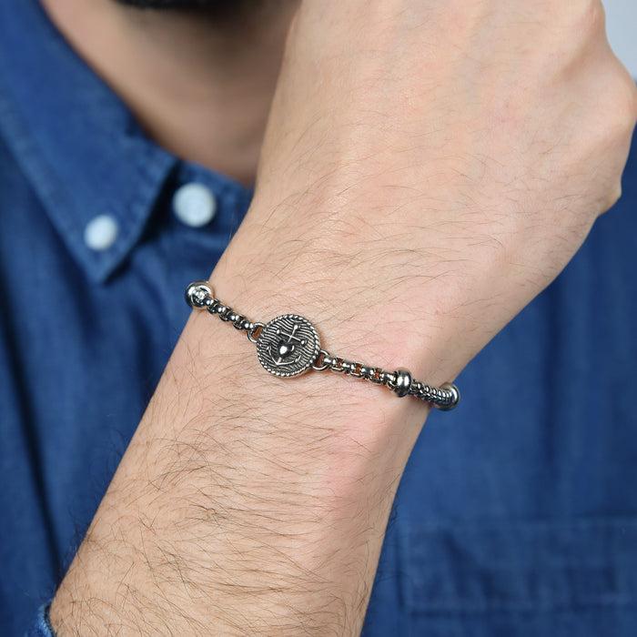 BRACCIALE UOMO IN ACCIAIO CON PIASTRA CON SMALTO NERO E ANCORA CON CUORE