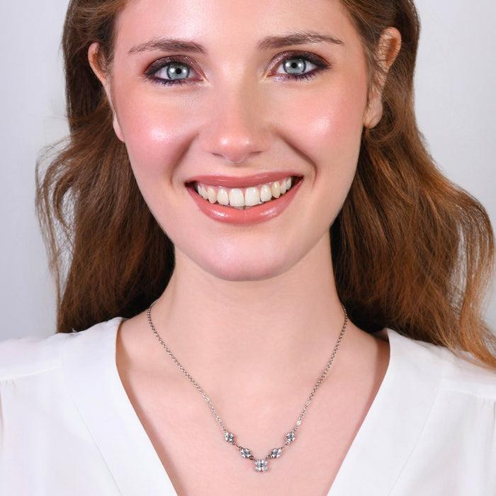 COLLANA IN ACCIAO CON QUADRIFOGLI E ZIRCONI BIANCHI